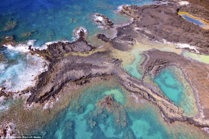 Another view of Sweetheart Rock in Lanai, Hawaii, this time seen from high above the waters and rocks