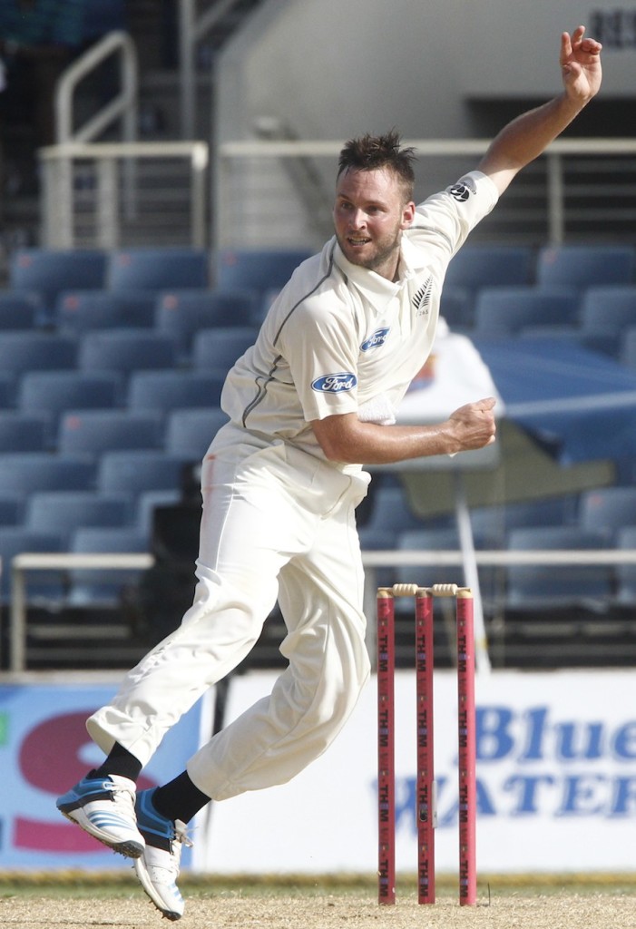 New Zealand's Mark Craig bowls during the second innings on the fourth day of their first cricket Test match against the West Indies in Kingston, Jamaica, Wednesday, June 11, 2014. (AP Photo/Arnulfo Franco)