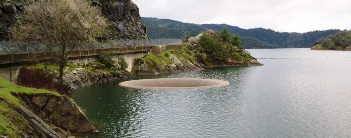 A spillway is a structure used to provide for the controlled release of wat...