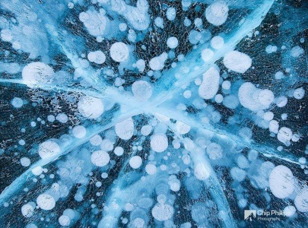 The striking Abraham Lake is home to an unusual phenomenon that needs to be seen to believe.