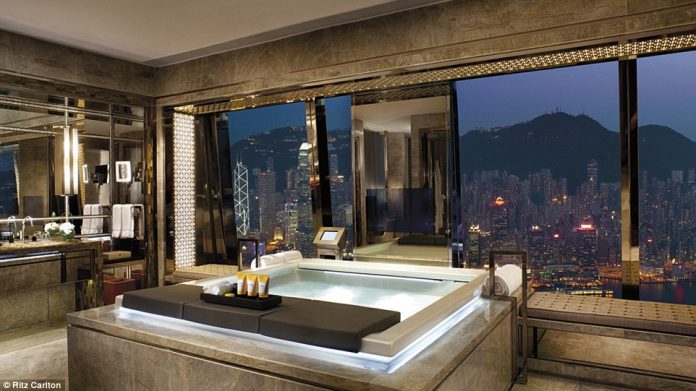 The oversized Jacuzzi in the Ritz Carlton Suite at the Ritz Carlton Hong Kong enjoys spectacular views