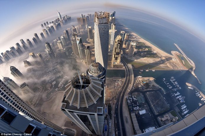 The keen and patient snapper estimates he has taken more than 300 photographs of the United Arab Emirates city during a six-year period