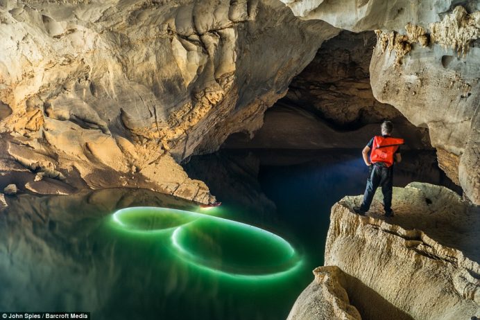 Water painting with kayaks and submerged LED lights near the downstream entrance of the cave 2
