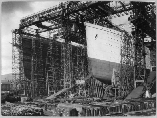 Olympic and Titanic, under construction, side by side. Belfast 1910.,