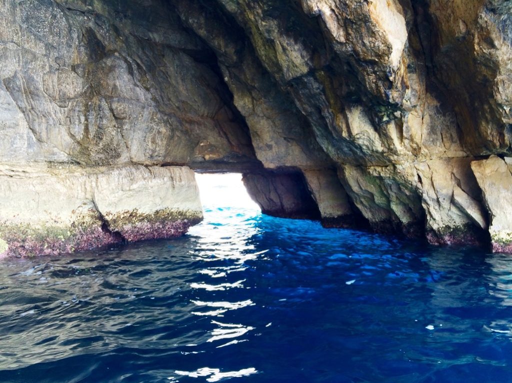 The Blue Grotto is a number of sea caverns on the South Coast of Malta, located within the Qrendi village, near "Wied iz-Zurrieq"