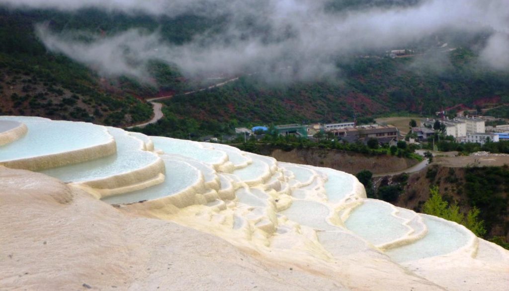 A difficult mountain road leads to the Baishuitai, almost three hour drive from Shangri-la. In-fact Baishuitai is a stunning, scenic, peaceful and worthwhile place.