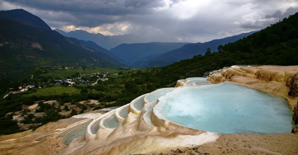 Baishuitai is a village (also known as White Water Terraces), between Lijiang and Shangri-La County in northwestern Yunnan province, China.