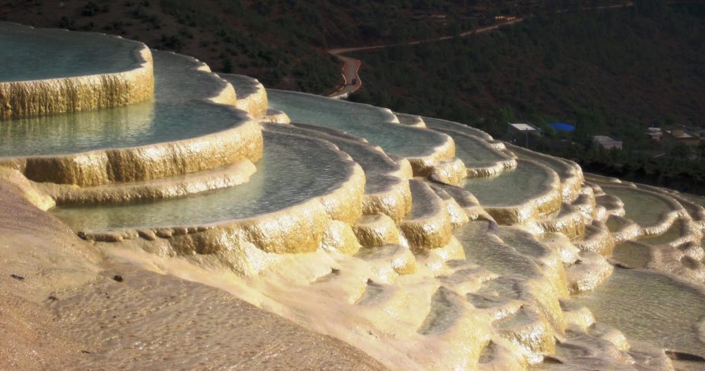 , the basins themselves have been hollowed out over time by the erosive action of the acidic water, which in earlier times, drew out certain minerals from the limestone, creating weak carbonic acid.
