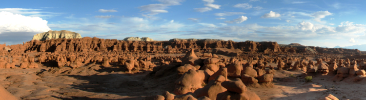 The Chaffin and his friends were awed by what they saw five buttes and a valley of strange, goblin-shaped rock formations fenced by a wall of eroded cliffs.