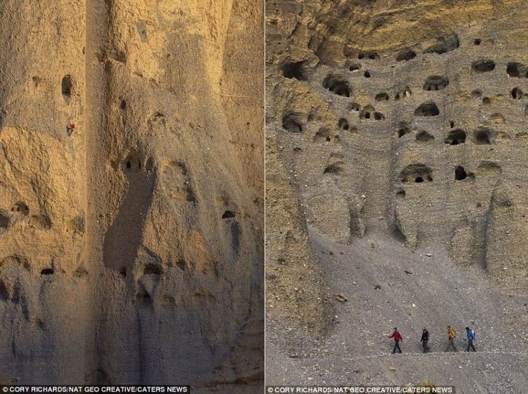 These caves are hundred meter high from the ground, in one of the many natural pillar like sandstone structures. A winding footpath climbs all the way from the bottom of the valley.
