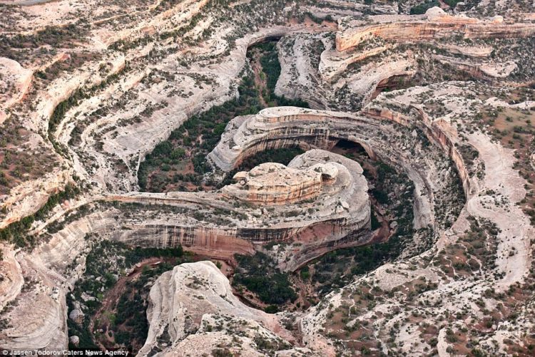 This picture from the unusual bird's-eye angle shows the Natural Bridges National Monument formed by rocks in Utah