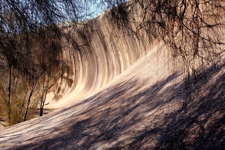 Wave Rock is 27 million years old and made up of grey and red granite strips, is quite a formation aboriginal rock paintings can also be seen at nearby Bates Cave.