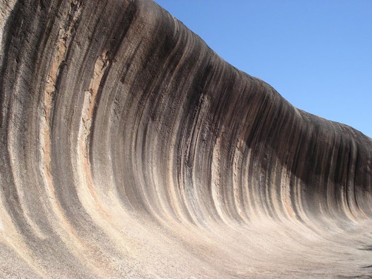 A flared slope is a concave-upward or -inward bedrock surface that is naturally found around the base of inselbergs, bornhardts, and granitic boulders and also on their higher slopes.