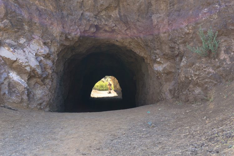 The remote looking craggy setting of Bronson Canyon Caves, or Bronson Caves, is a popular filming section of Griffith Park in Los Angeles.