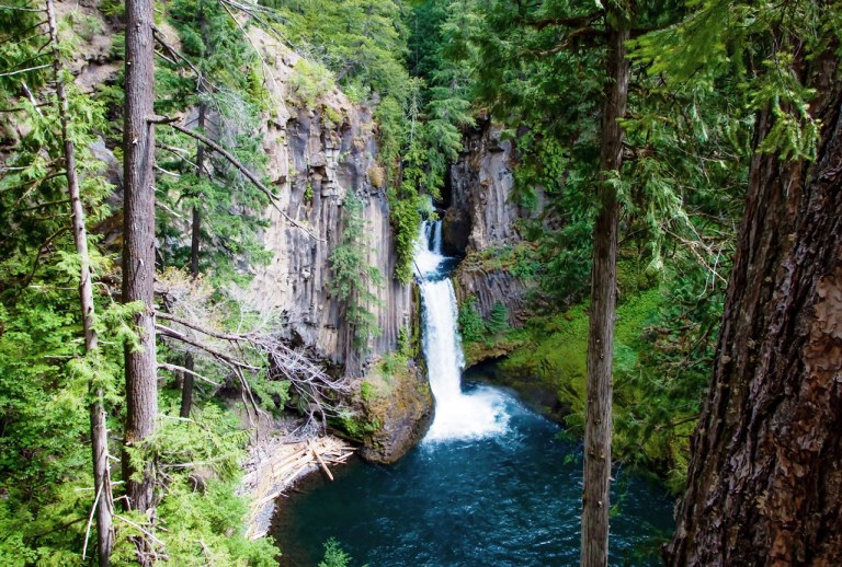 Toketee Lake is formed by damming. Prior to the penstock, the North Umpqua River flowed over the falls in its entirety, but the flow has been reduced as a result of generating hydroelectricity from the drop.
